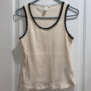 Beige tank top with black crochet trim size Medium